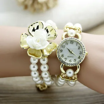 Shsby Nova moda Ženske haljine Satovi ženski biserna lanac bijeli cvijet narukvica kvarcni ručni satovi Ženski sat sa štrasom